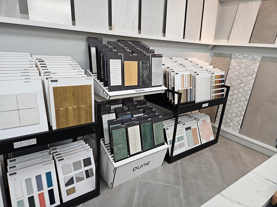 Wall tile and decorative material samples displayed in the Unique BKB showroom